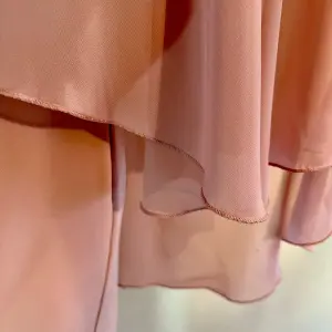 Suit with Fluid Cover and Embroidery