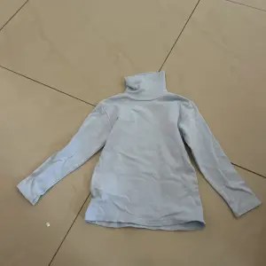 Pull à colle roulé pour fille 