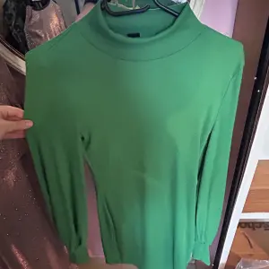 Polo à col roulé