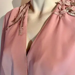 Suit with Fluid Cover and Embroidery